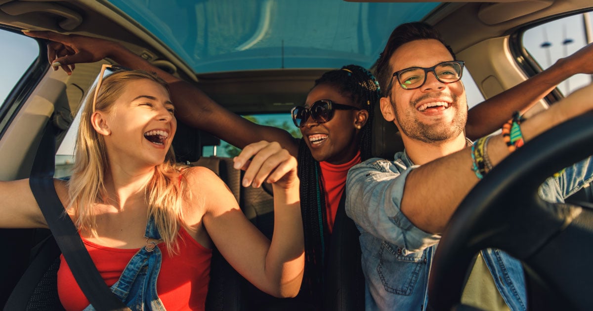 Group of friend in car with tipsy driver