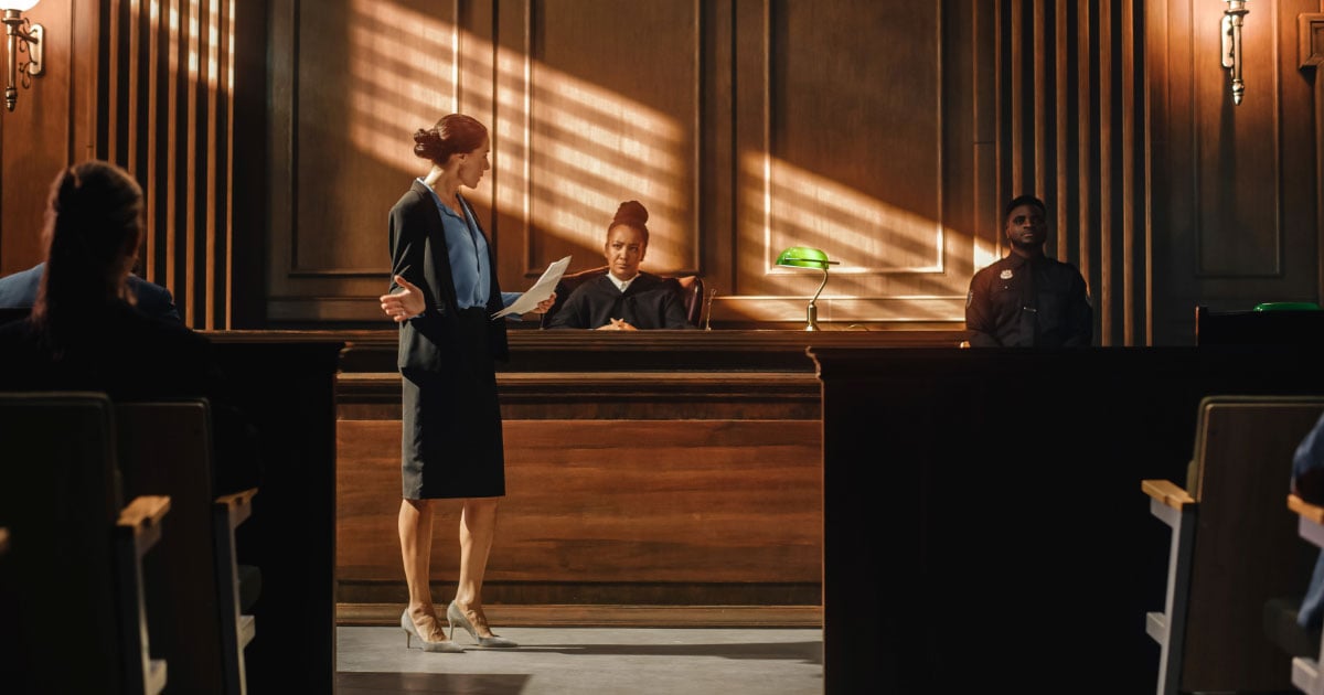 Woman making argument in courtroom