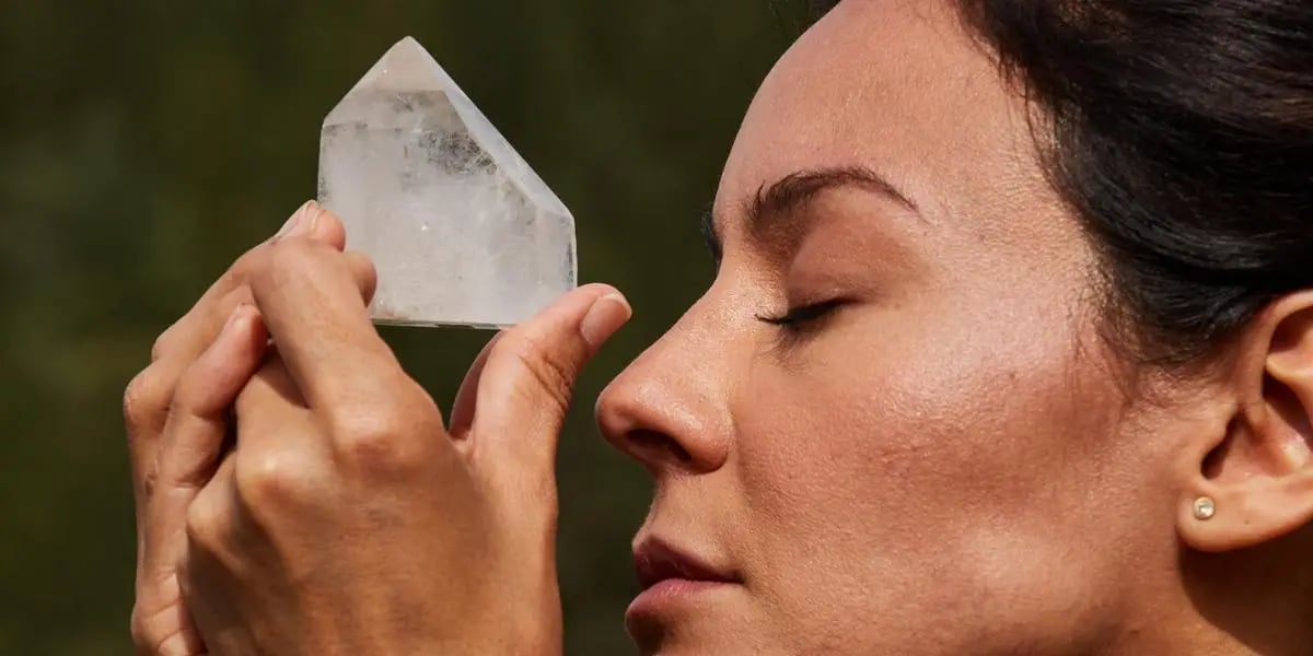 Crystals For Meditation 1 women holding crystals during meditation