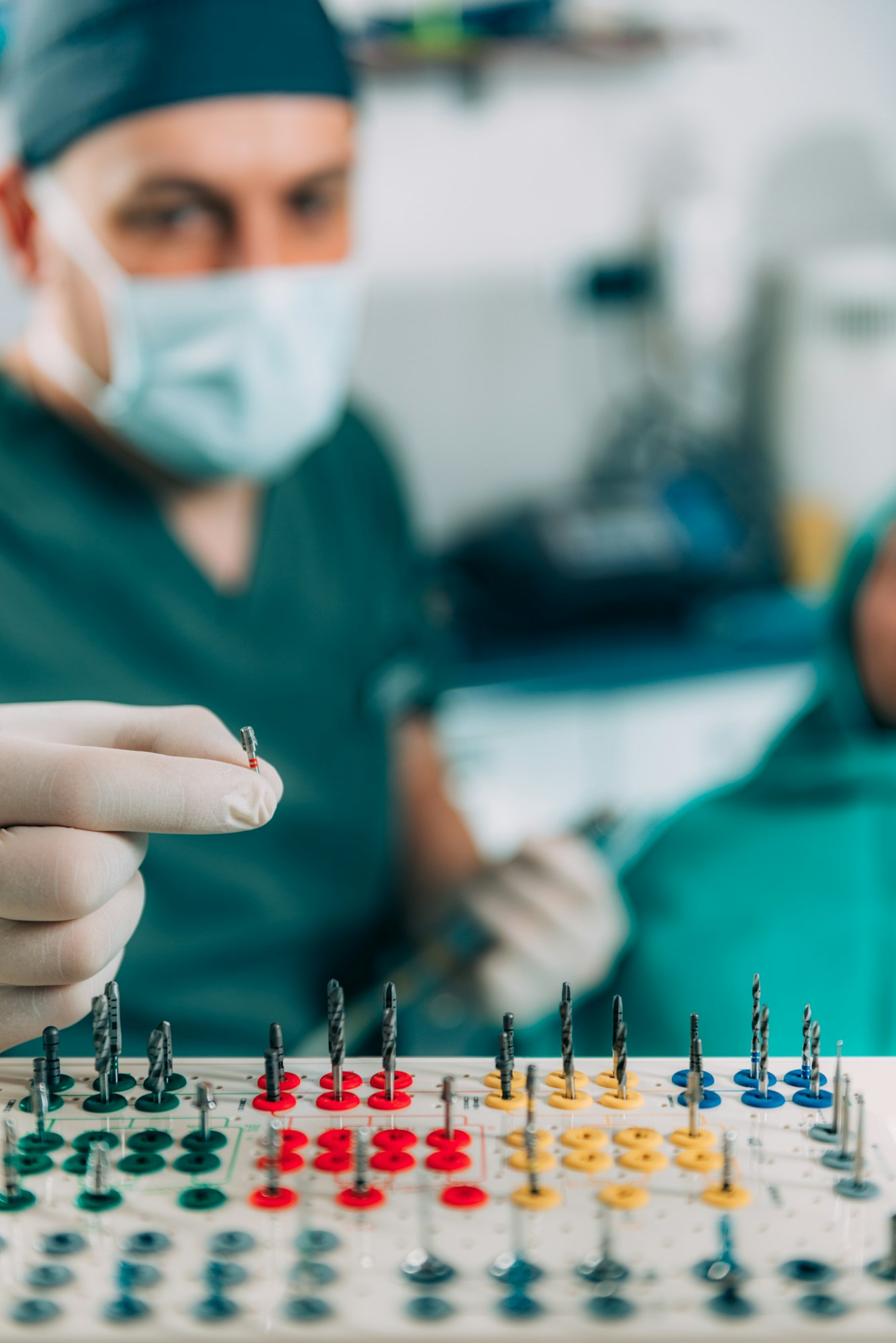 Affordable Dental Implants Turkey (2026): Cheap & Safe Packages 58 Dentist with tool for the installation dental implants