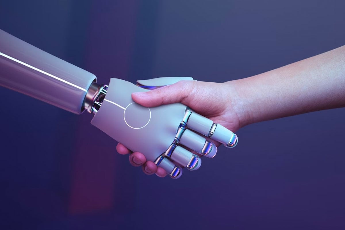 Un chatbot le da la mano a un humano con un fondo morado.