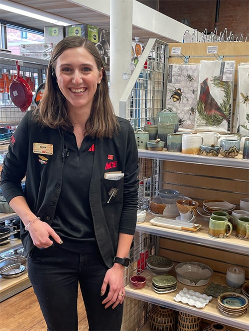 Ace Employees Standing in Aisle