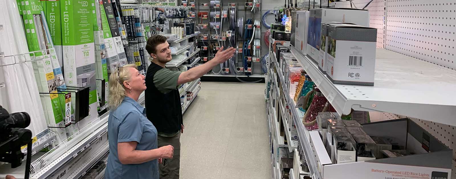Owenhouse Employee Helping Customer