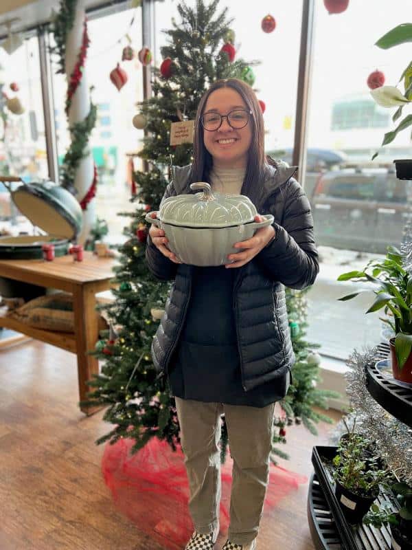 Ace Customer Holding Pumpkin Shaped Pot