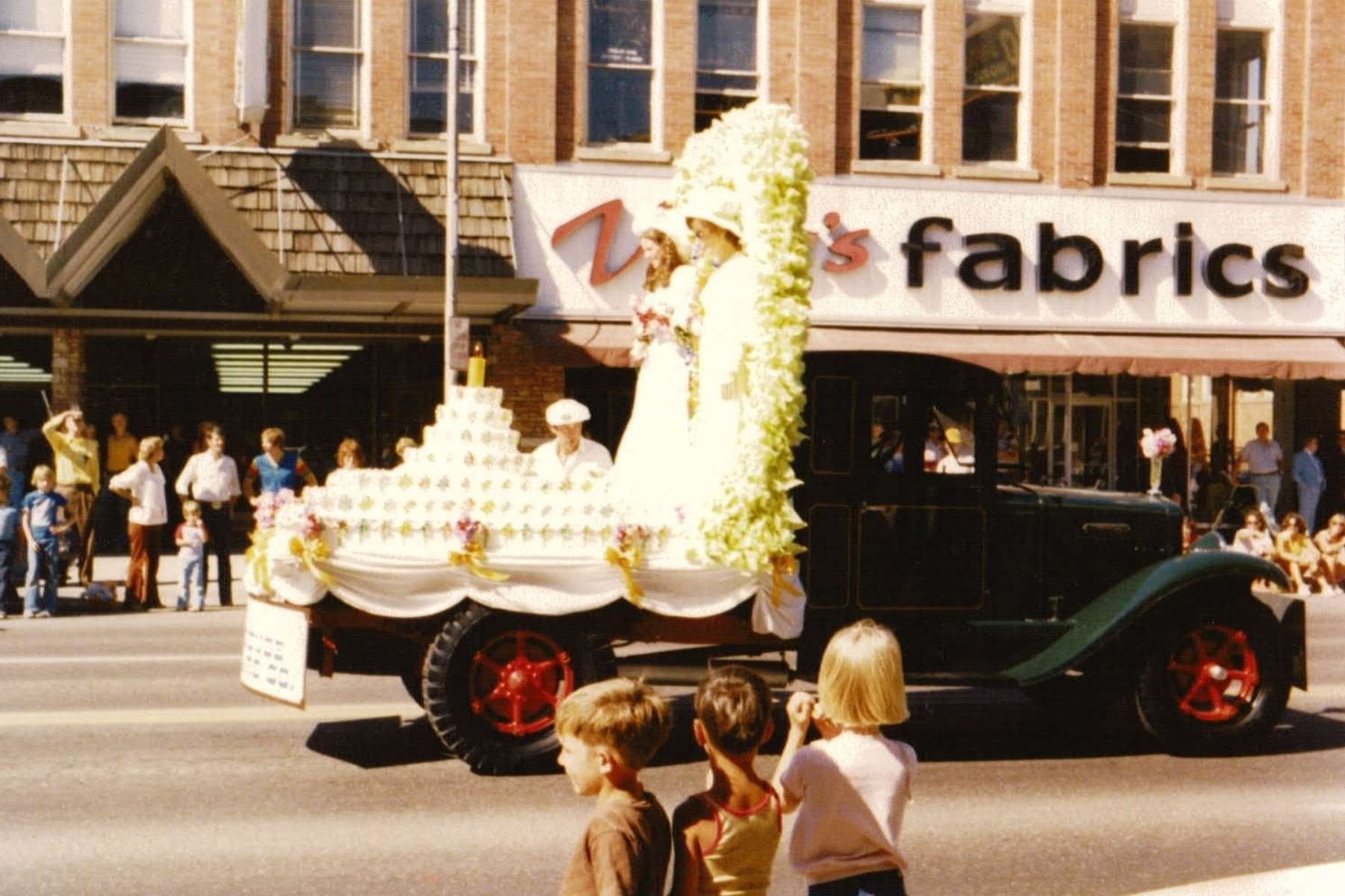 sweet pea festival centennial cake on truck float for festival