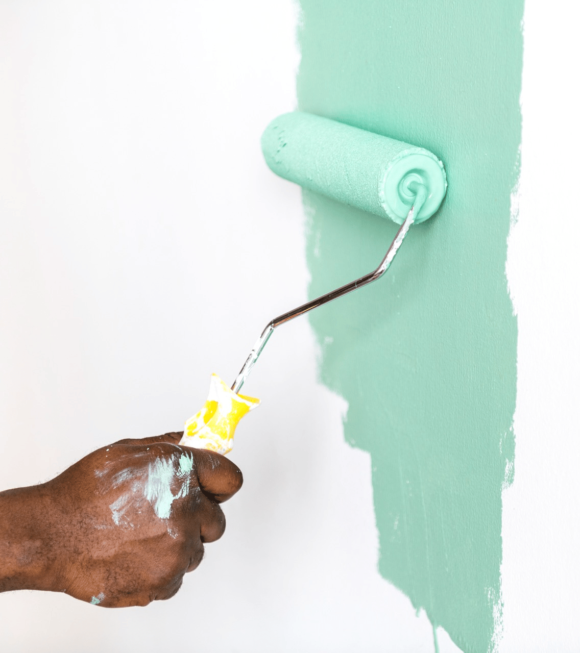 people painting house walls