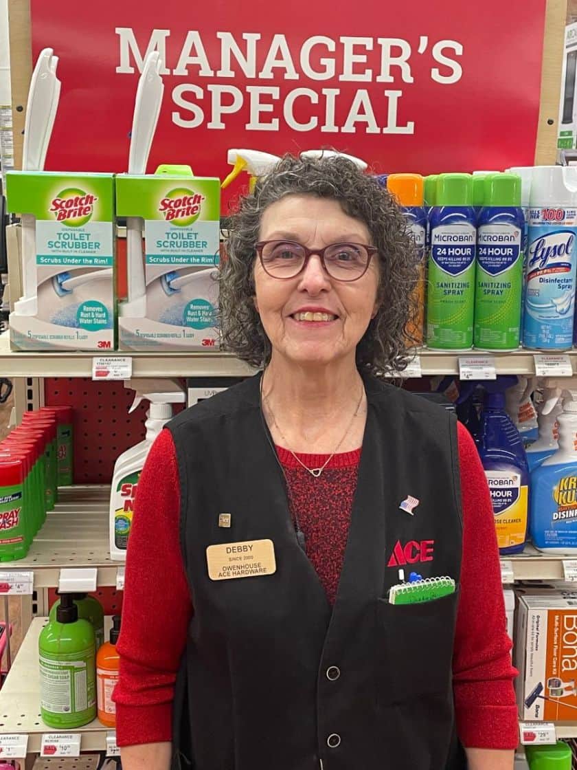 Debby Standing in Front of Manager's Specials