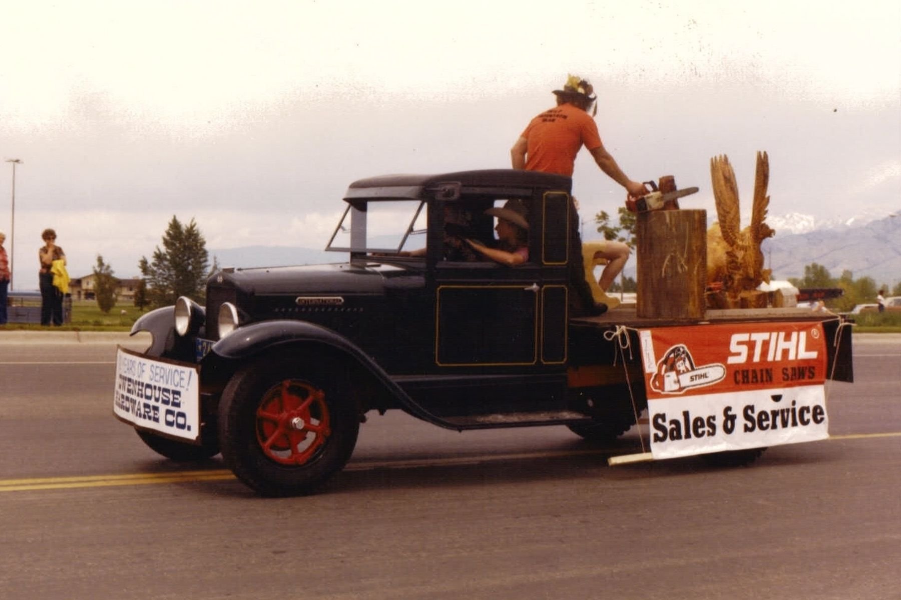old truck employee chainsaw carving art on bed
