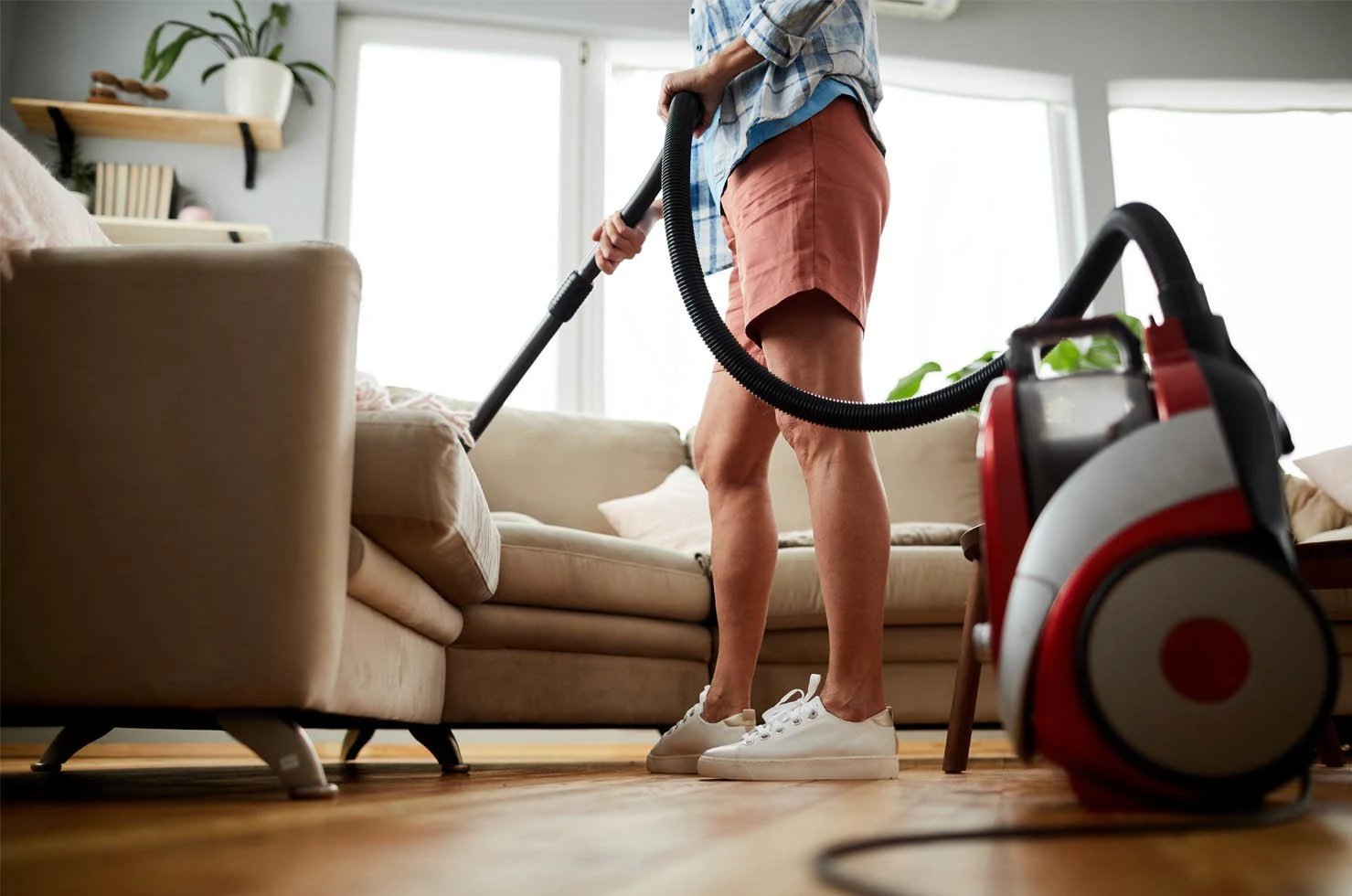 cleaning a sofa with a vacuum cleaner at ace hardware ownhouse