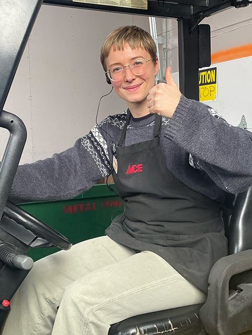 Ace Employees Standing in Aisle