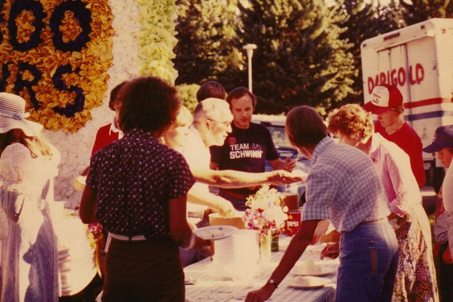 sweet pea festival cake float people in foreground