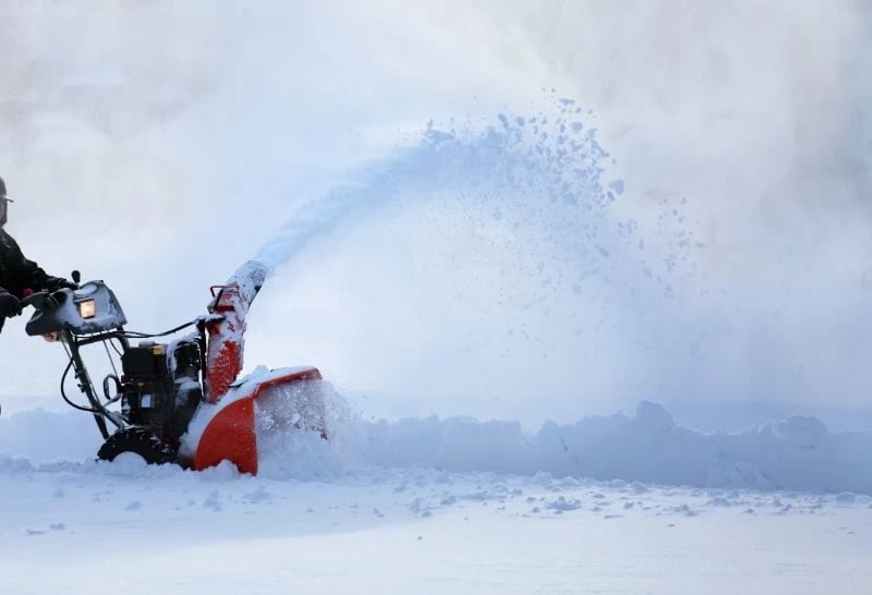 snow blower clearing snow in bozeman montana