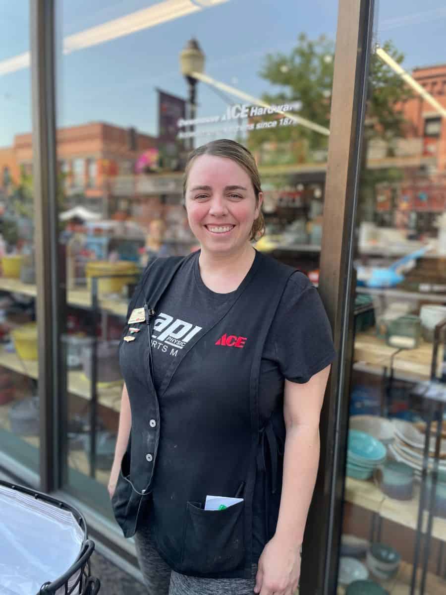 Ace Employee Standing in Front of the Store