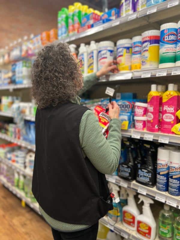 Ace Employee Stocking Cleaning Isle
