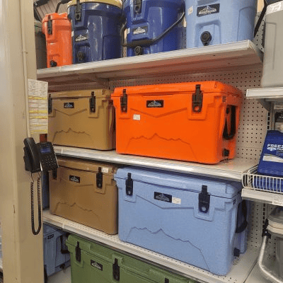multi-colored lone coolers on shelf
