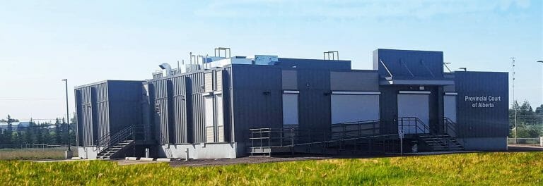 a building next to a fence