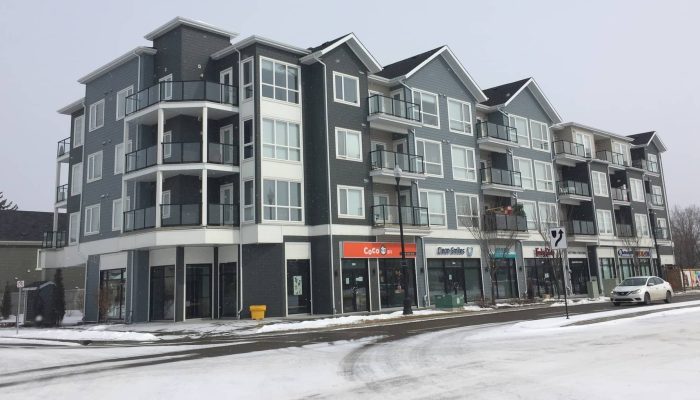 Victoria Crossing_Mixed Use a building covered in snow