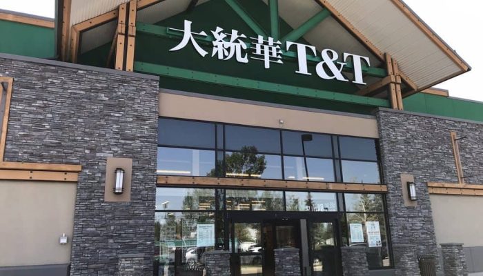 T&T Supermarket a sign above a store in a brick building