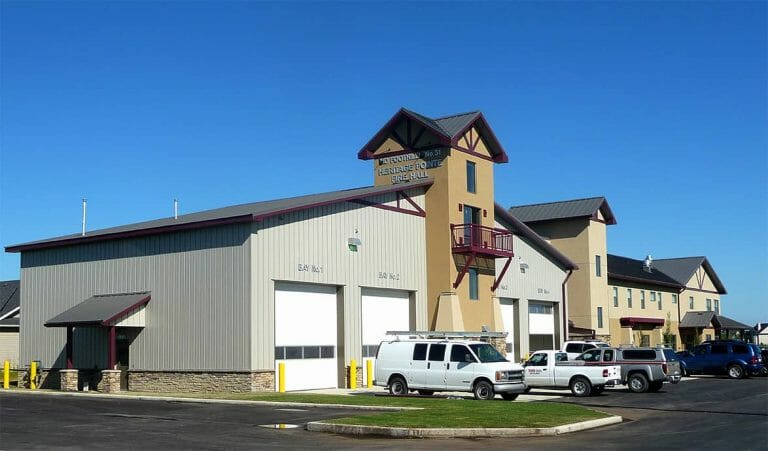 a truck parked on the side of a building