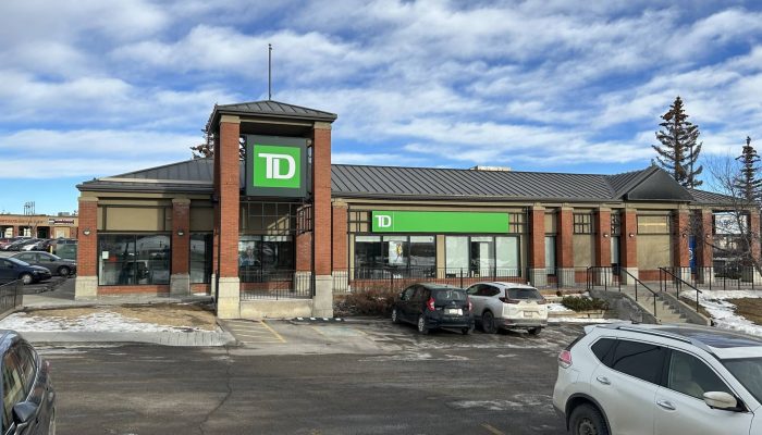 TD Bank Beddington Towne Center a car parked on the side of a building