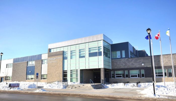 Windsong a building with snow on the ground