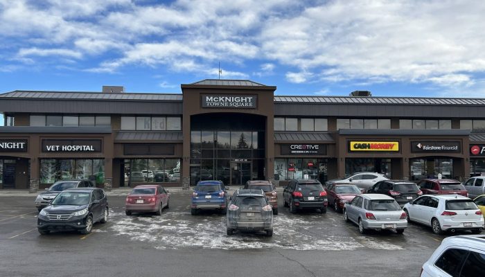 Cover Photo_Towne Square a car parked in a parking lot