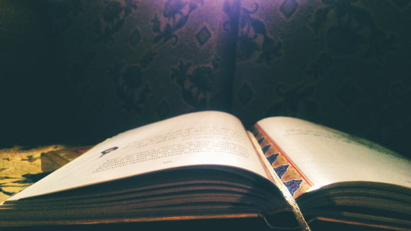 opened book on textile