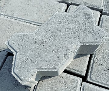 A set of Interlocking pavers natural in natural grey