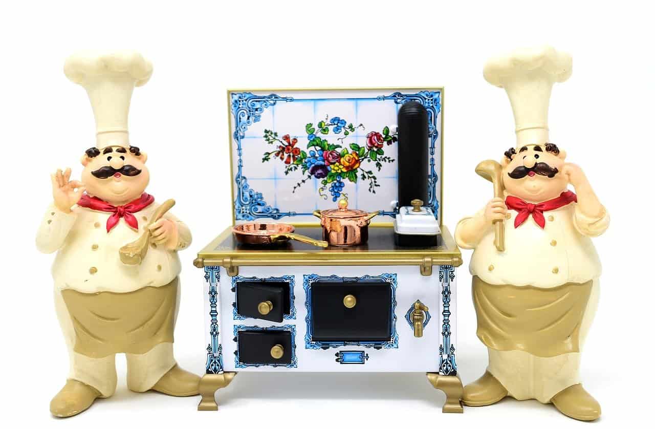 Die Alten lieben das Leben Köche Herd Pfanne Topf Essen Küche Lebensmittel