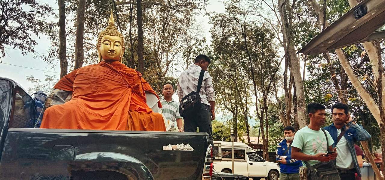 Buddha in the back of a truck