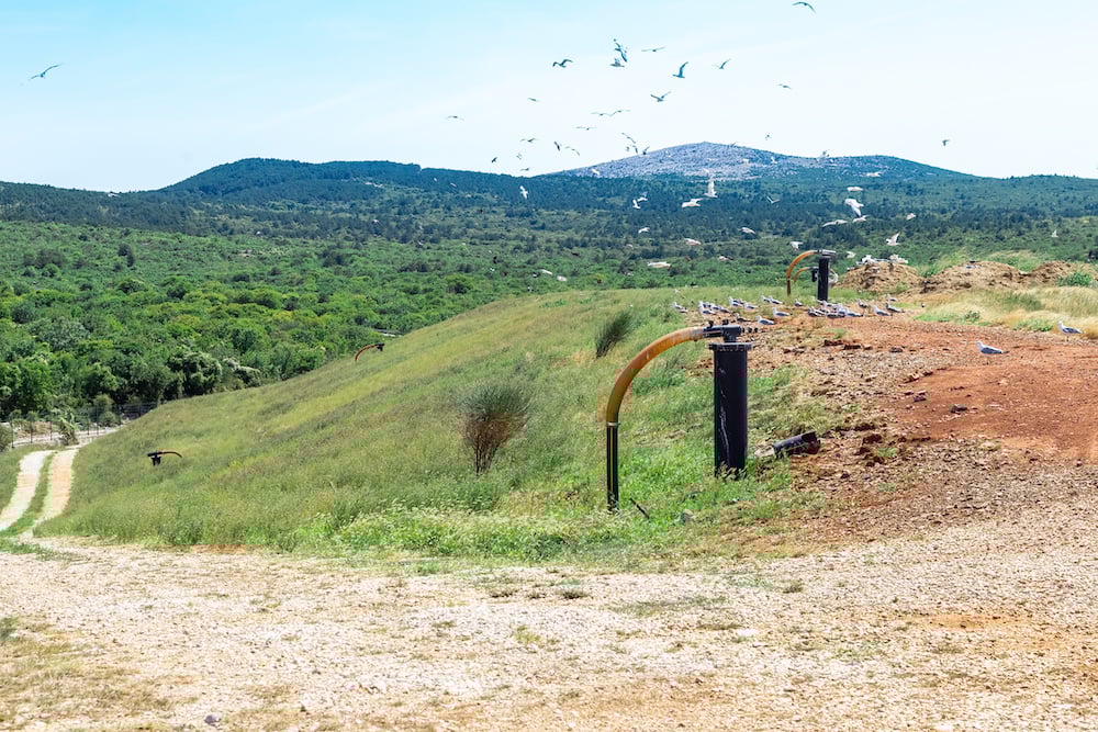 Landfill site degassing to prevent gas explosion