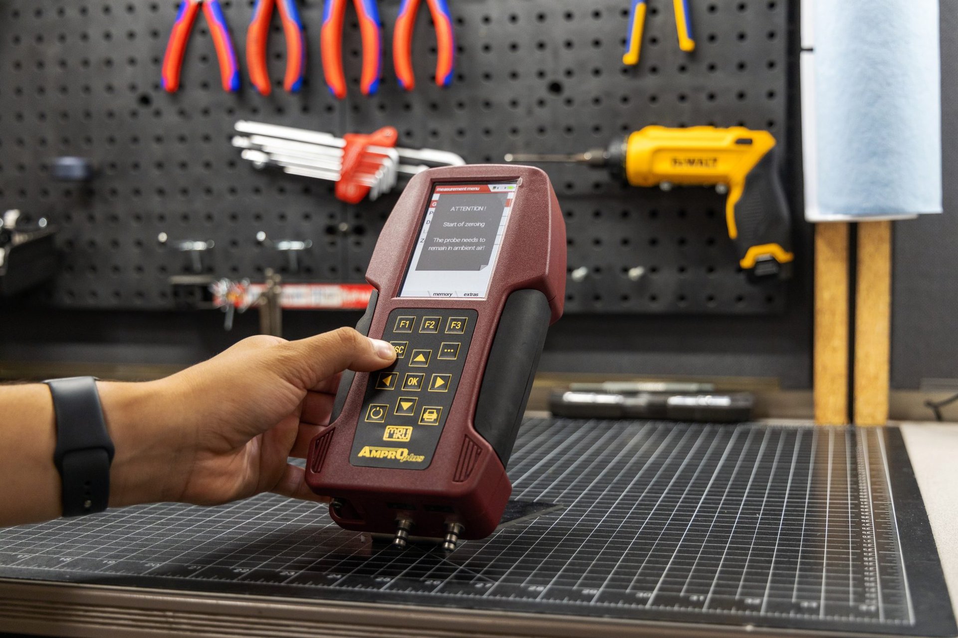 MRU employee testing gas analyzer