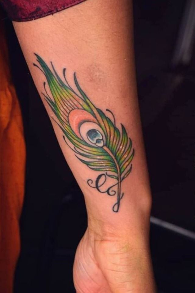 Back of the Wrist Mor Pankh Tattoo