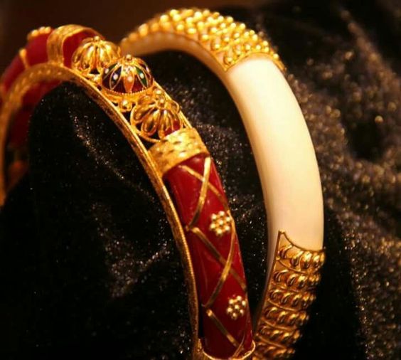 Gold Bracelets with Red Bangles
