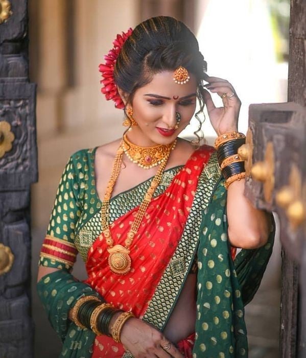 Curled Locks Floral Bun Marathi Bridal Hairstyle