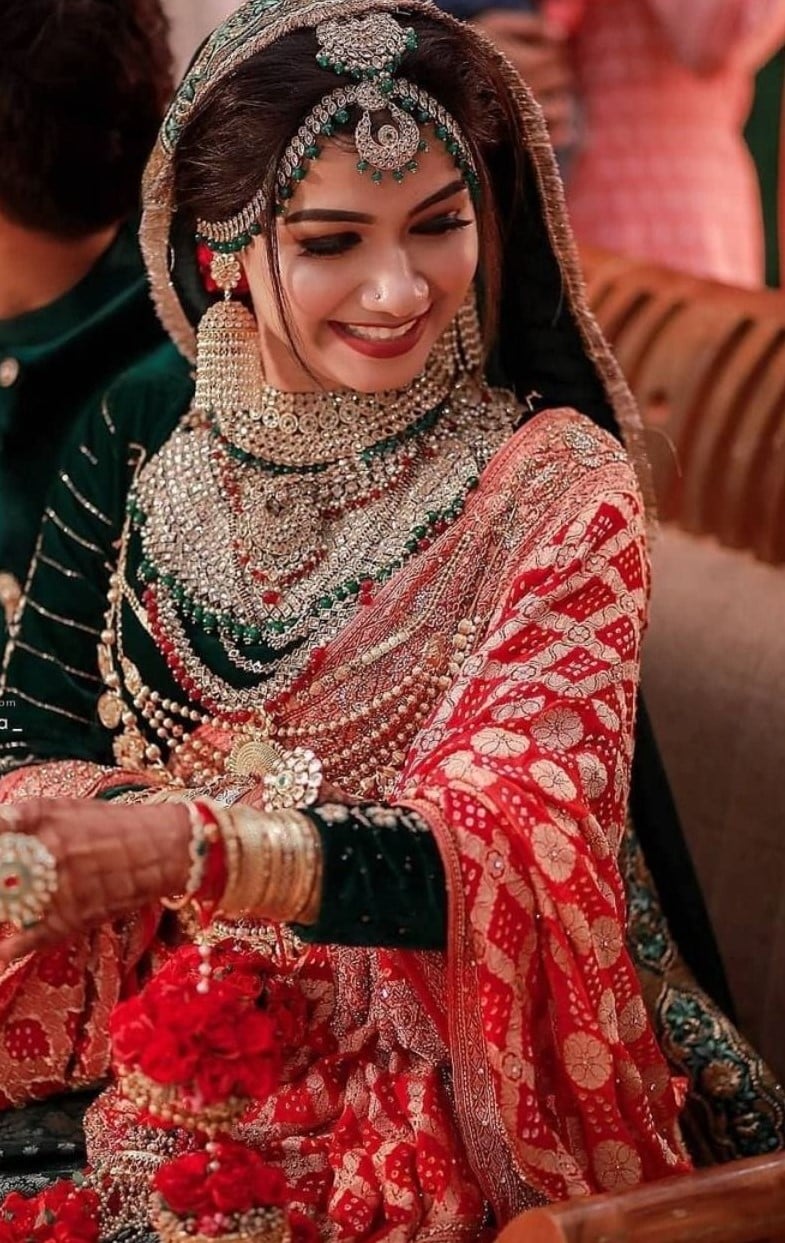 Red and Green Bridal Lehenga With Green Jewellery