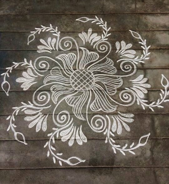 Rangoli Kolam with Lines and Leaves