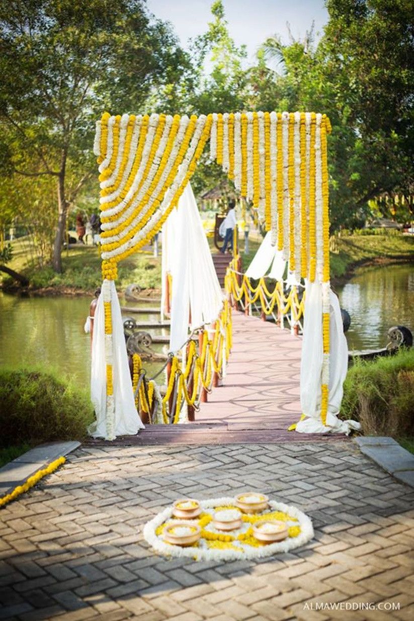 Yellow and White ‘Genda’ Bengali Wedding Flower Gate Decoration