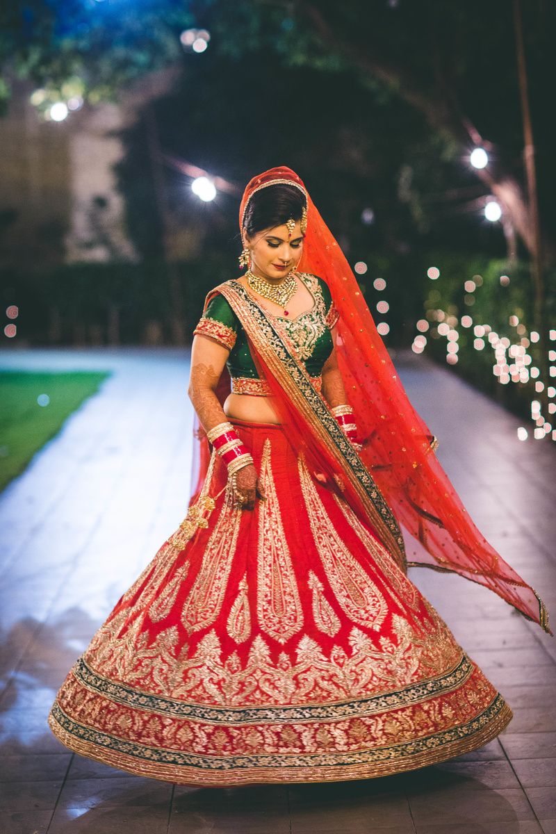 The Warm Red and Green Bridal Lehenga