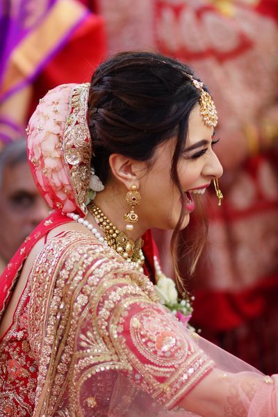 Covered Bun Hairstyle with Jasmine Flower