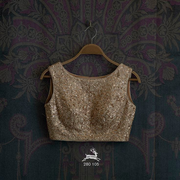 The Chunky Metal Sleeveless Blouse Design Idea