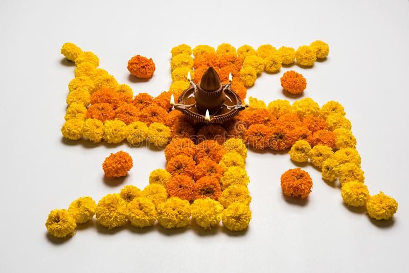 Mangalik Flower Rangoli Design with Swastika