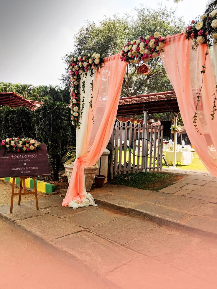 Pastel Curtain Bengali Wedding Flower Gate Decoration with Roses