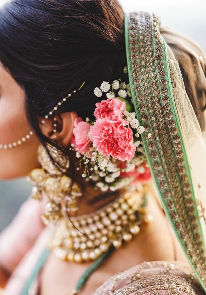 Bun Orchid Flower Hairstyle in Pink