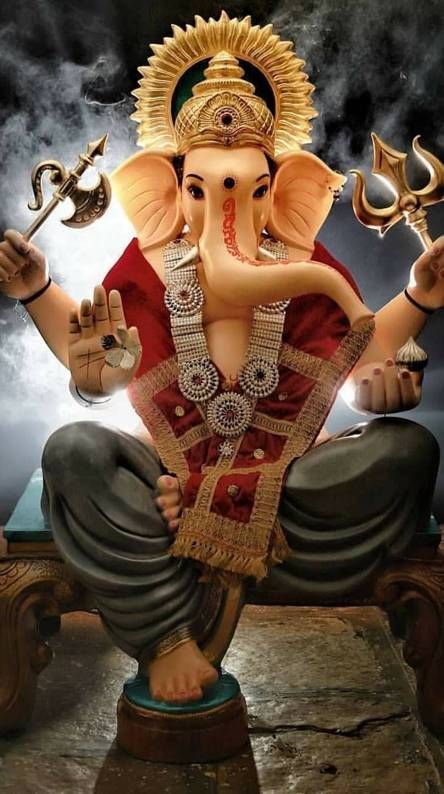 Lighting Candles for Ganesha Decoration