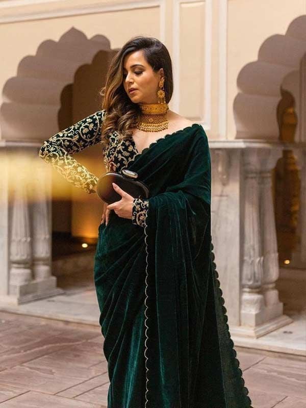 The dark green bridal saree