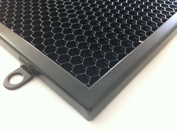 Honeycomb mesh contained in a metal frame Honeycomb mesh contained in a metal frame
