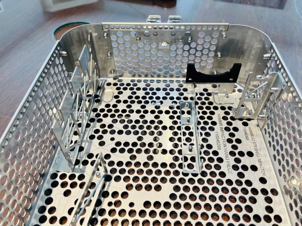 Laser etched basket for authopaedic implant surgery