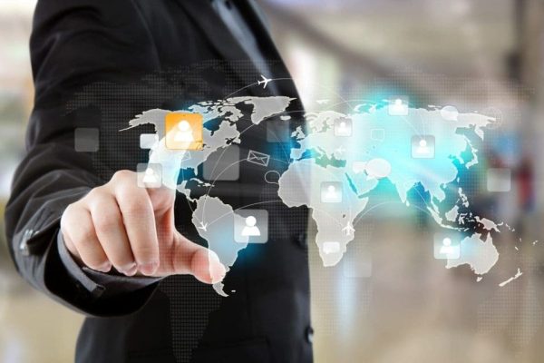 Social Network concept : Business man  point to social network and world map