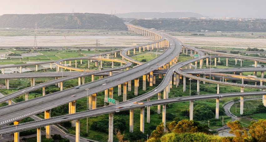 An aerial view of a highway with many bridges showcasing the impressive feats of transportation engineering.